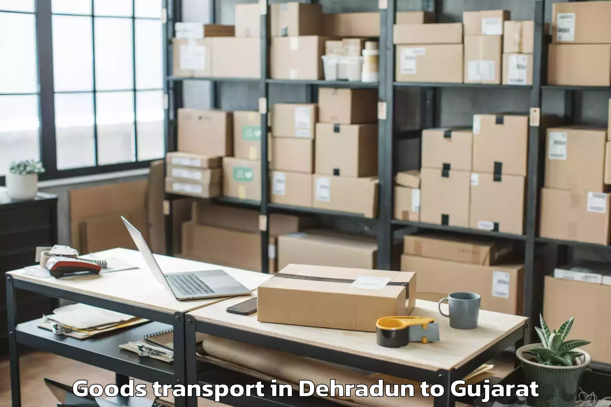 Book Dehradun to Kundla Goods Transport